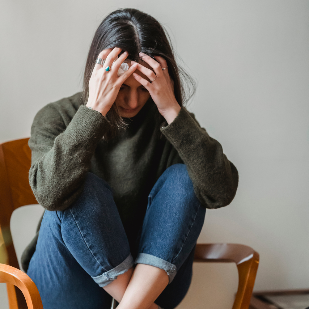 adult dealing with stress anxiety or low self-esteem.